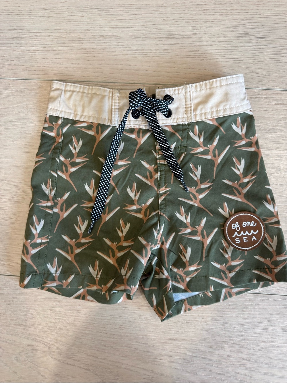 Of One Sea Kids Olive Swim Trunks with Tan Leaf Print | Size 1/2